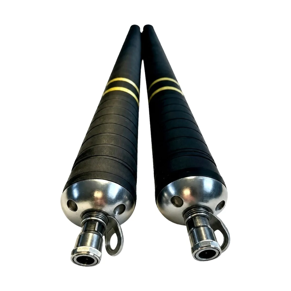 Close-up of spring-loaded wheel carriage arms mounted to packer end plate for pipe centering.